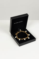 STRING OF PEARLS BRACELET 18KT GOLD