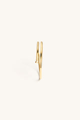 TWISTED NAIL BANGLE 18KT GOLD