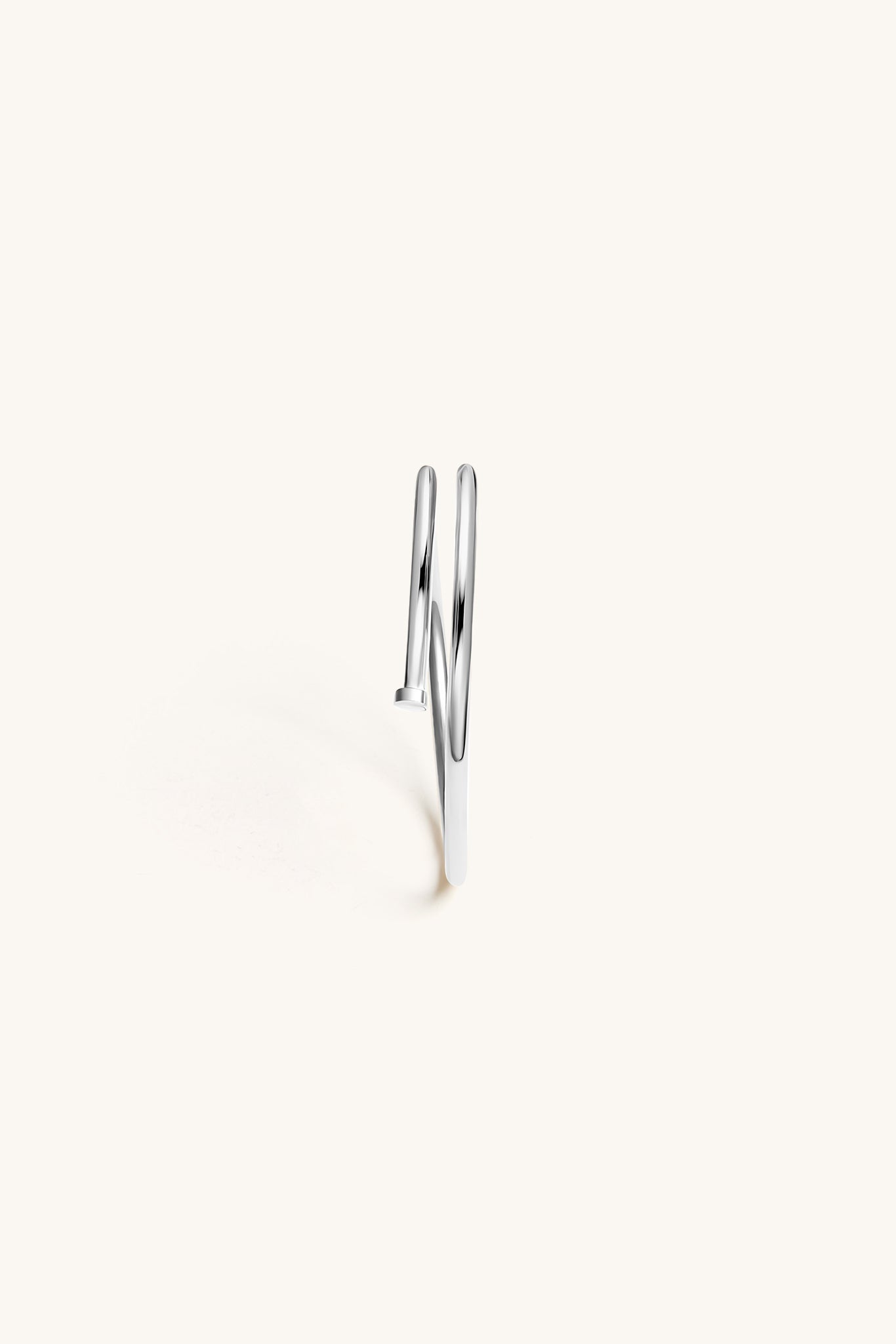 TWISTED NAIL BANGLE